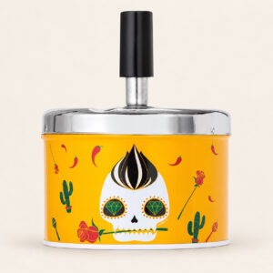 Cendrier Hornet Calaveras jaune à poussoir, couvercle chromé et bouton noir sur fond crème